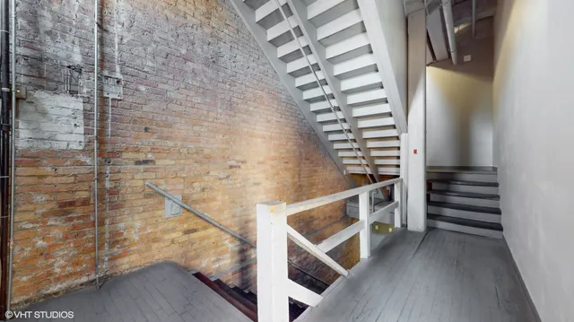 a bathroom with a sink a mirror and shower