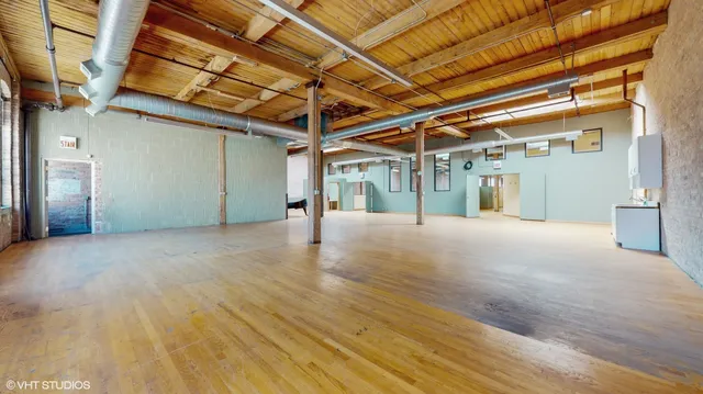 a view of garage with stairs