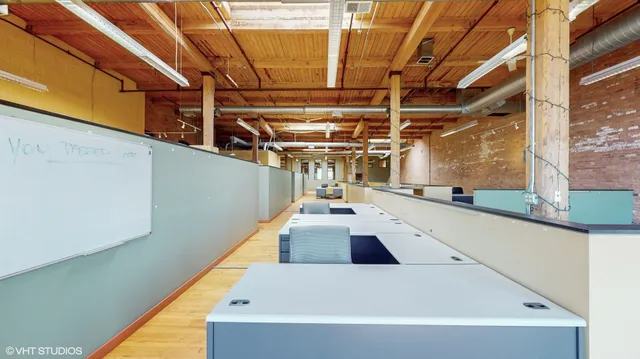 a view of parking garage with cars