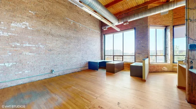 a white and white photo of a white wall