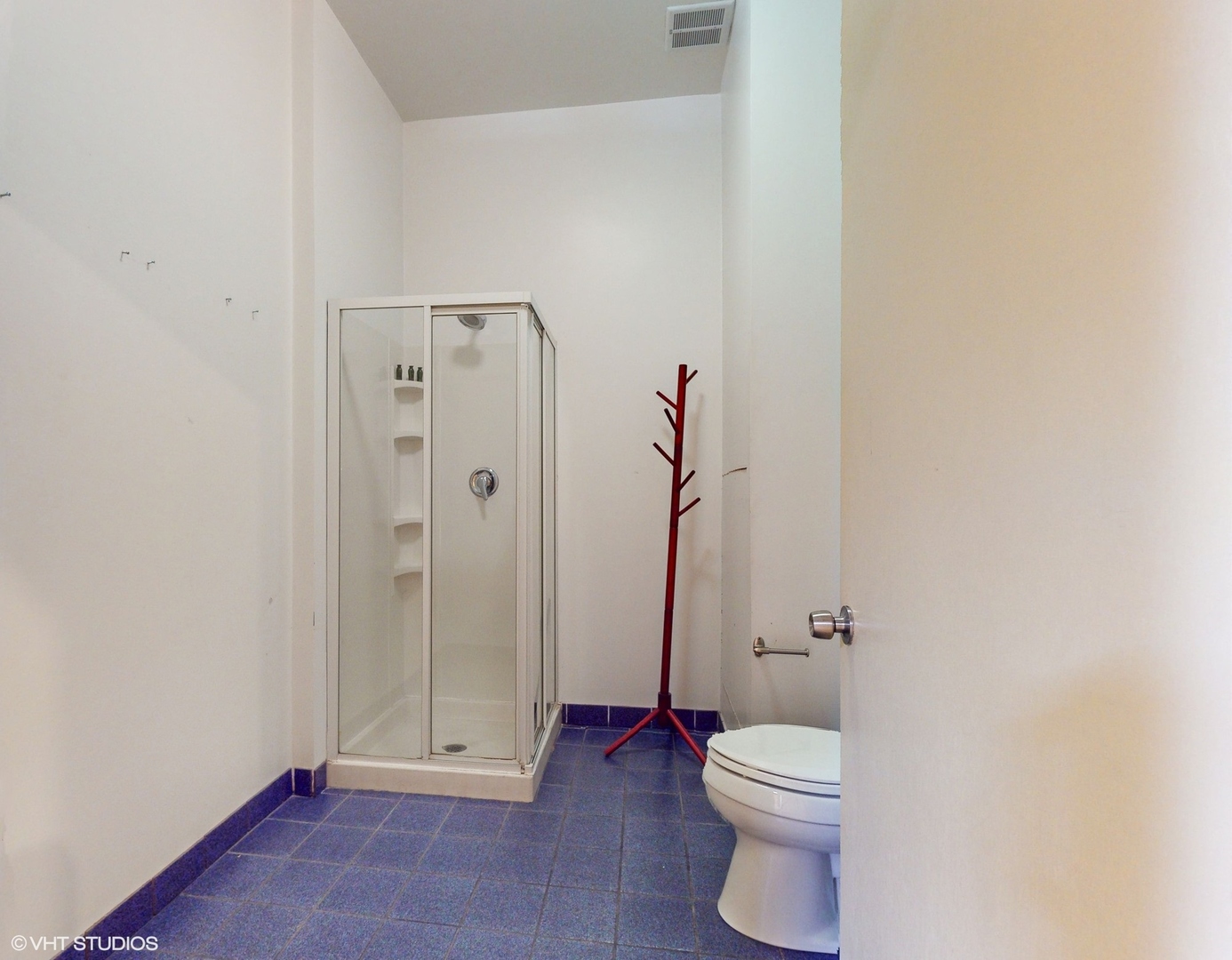 2241 South Wabash Avenue Chicago, IL 60616 - Photo 61 of 91 a bathroom with a toilet and a shower