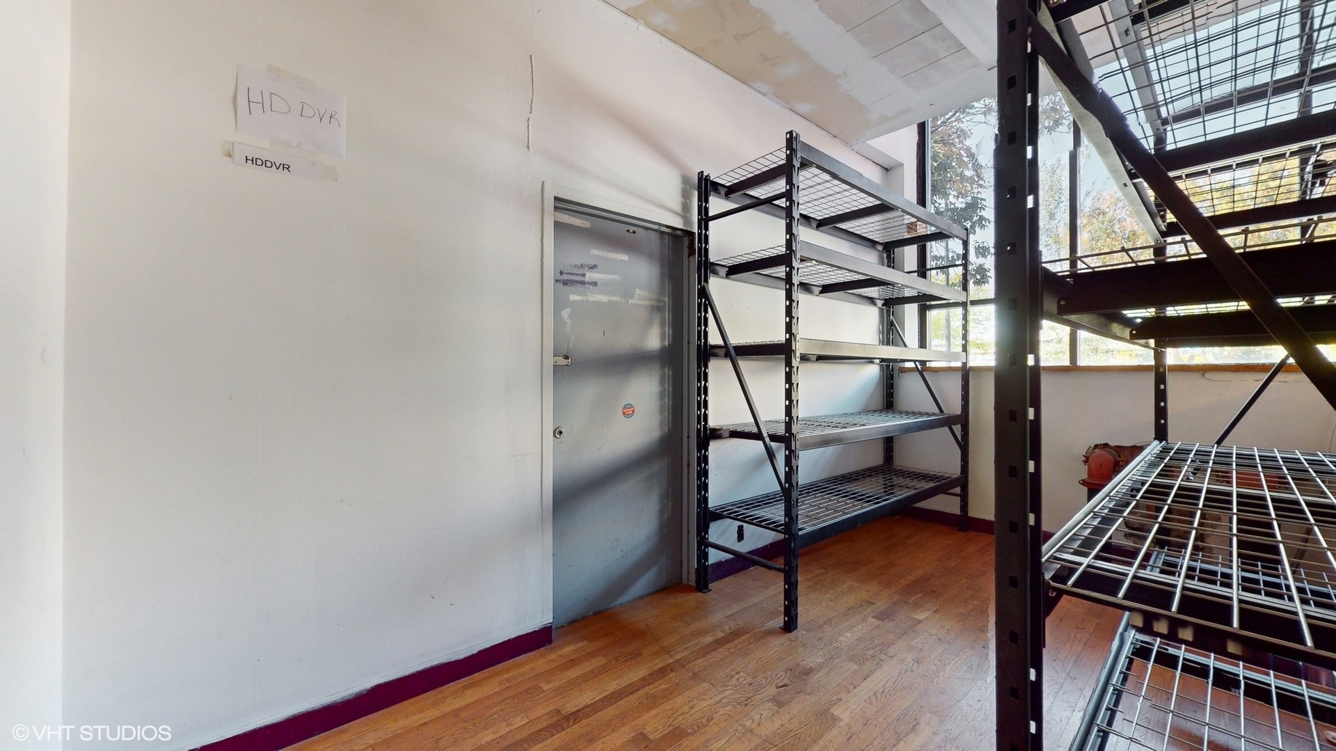 2241 South Wabash Avenue Chicago, IL 60616 - Photo 68 of 91 an empty room with wooden floor and windows