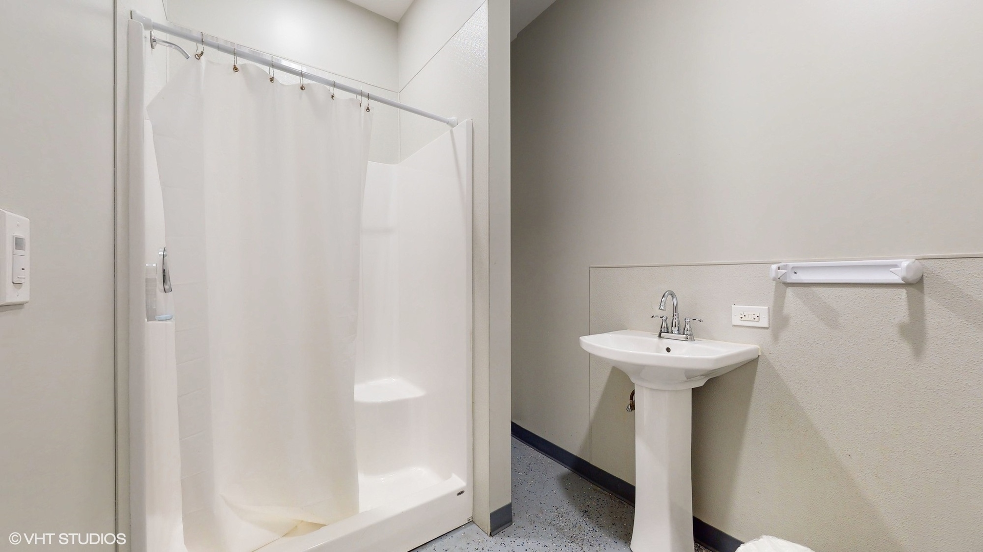 2241 South Wabash Avenue Chicago, IL 60616 - Photo 70 of 91 a bathroom with a sink a mirror and shower