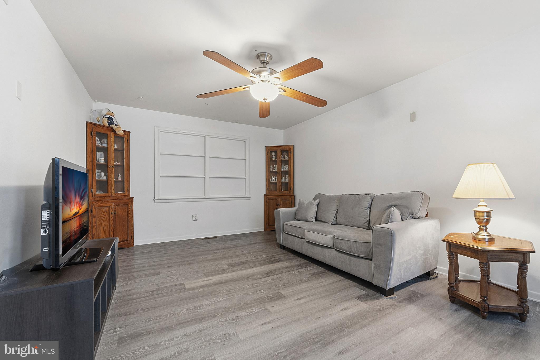307 Hialeah Drive Cherry Hill, NJ 08002 - Photo 12 of 34 a living room with furniture and a flat screen tv