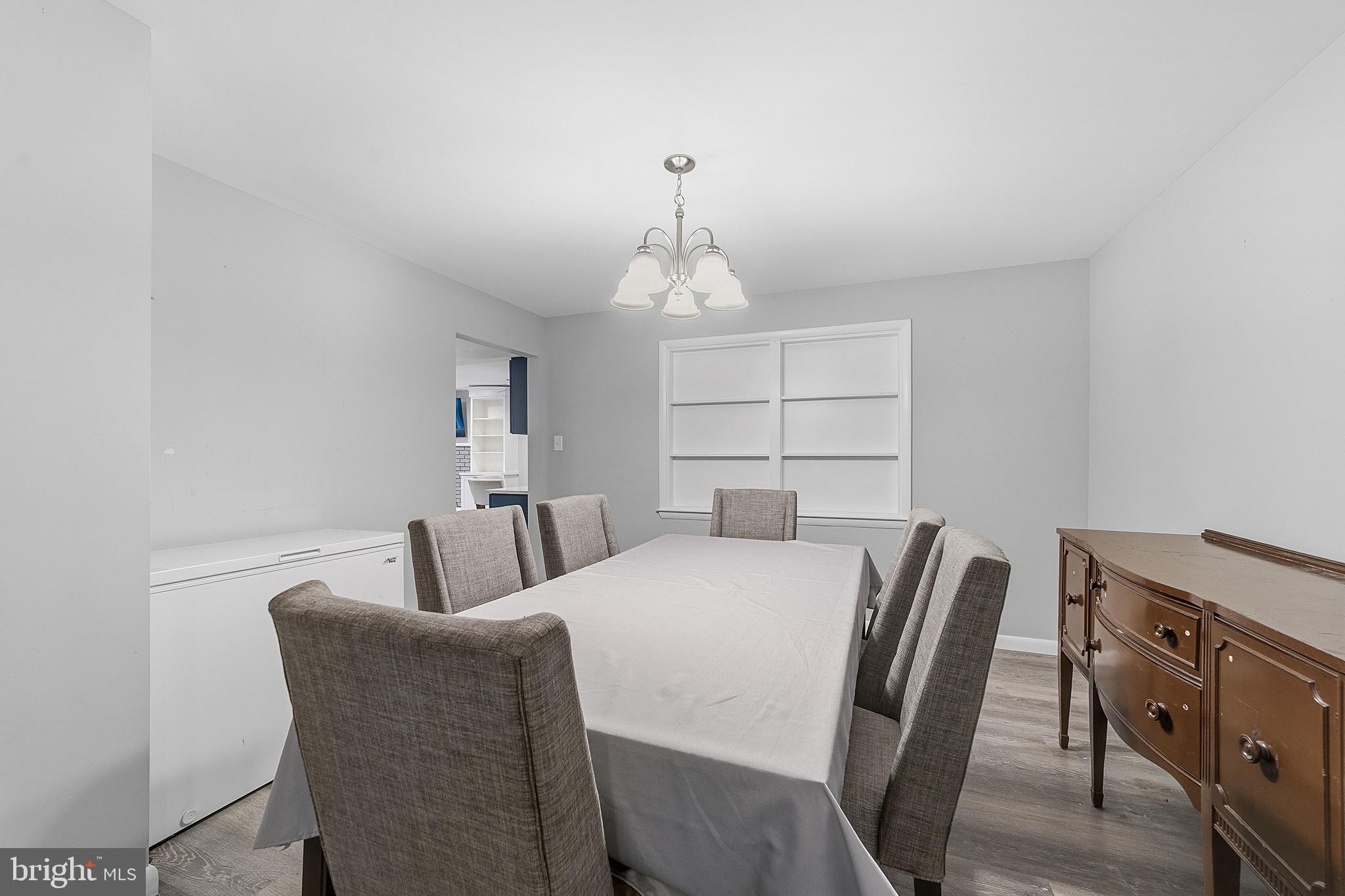 307 Hialeah Drive Cherry Hill, NJ 08002 - Photo 15 of 34 a bedroom with a bed and a chandelier