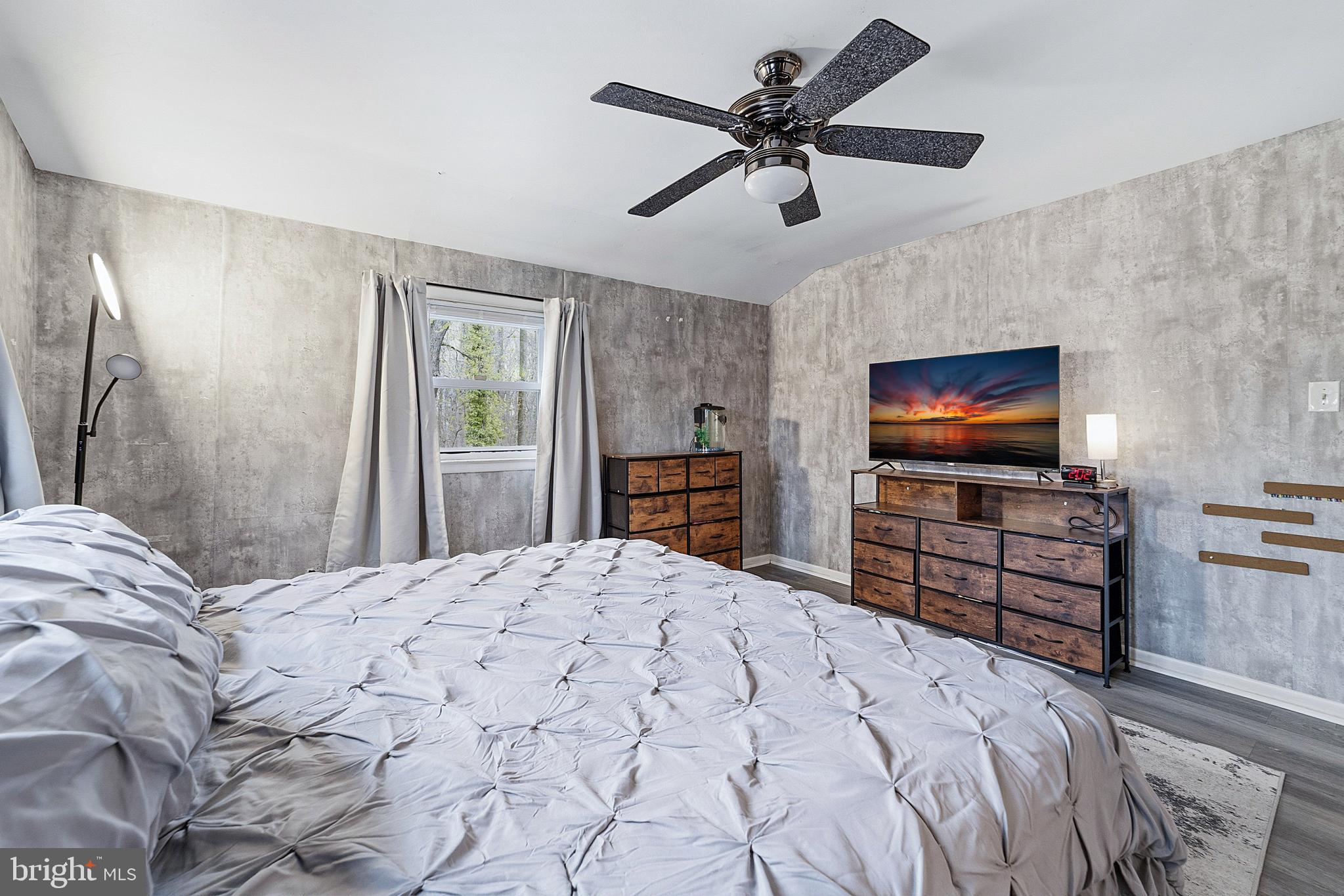 307 Hialeah Drive Cherry Hill, NJ 08002 - Photo 21 of 34 a bedroom with a bed and a flat screen tv