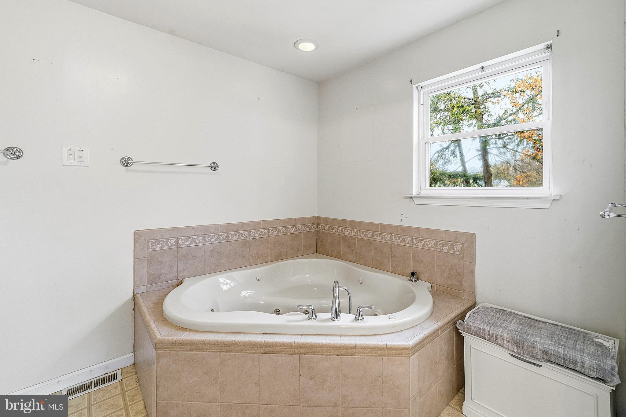 307 Hialeah Drive Cherry Hill, NJ 08002 - Photo 23 of 34 a white bath tub sitting in a bathroom