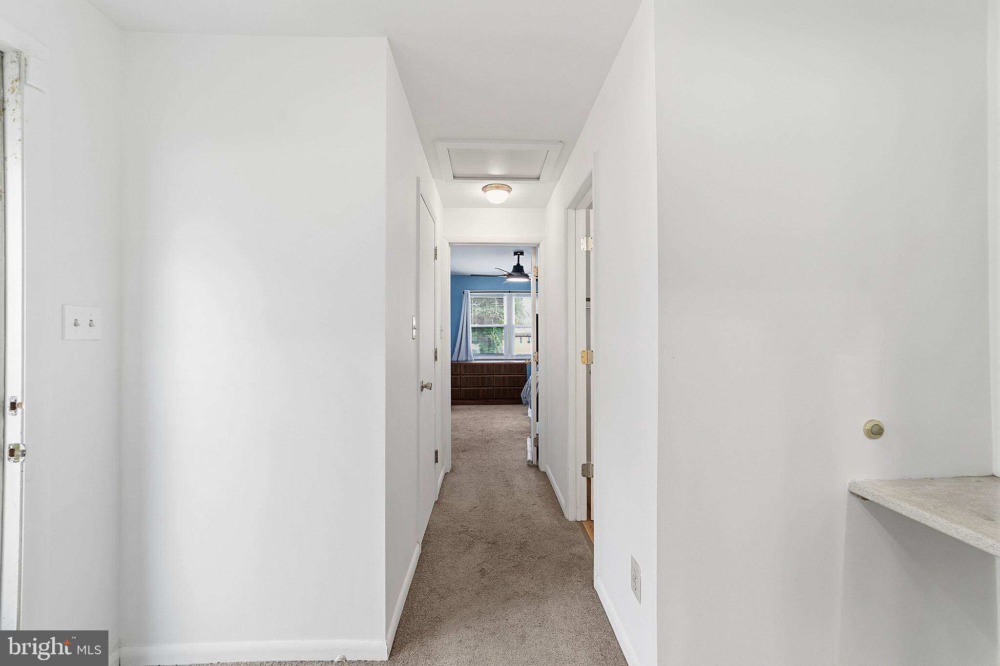 307 Hialeah Drive Cherry Hill, NJ 08002 - Photo 27 of 34 a view of a hallway with wooden shelves