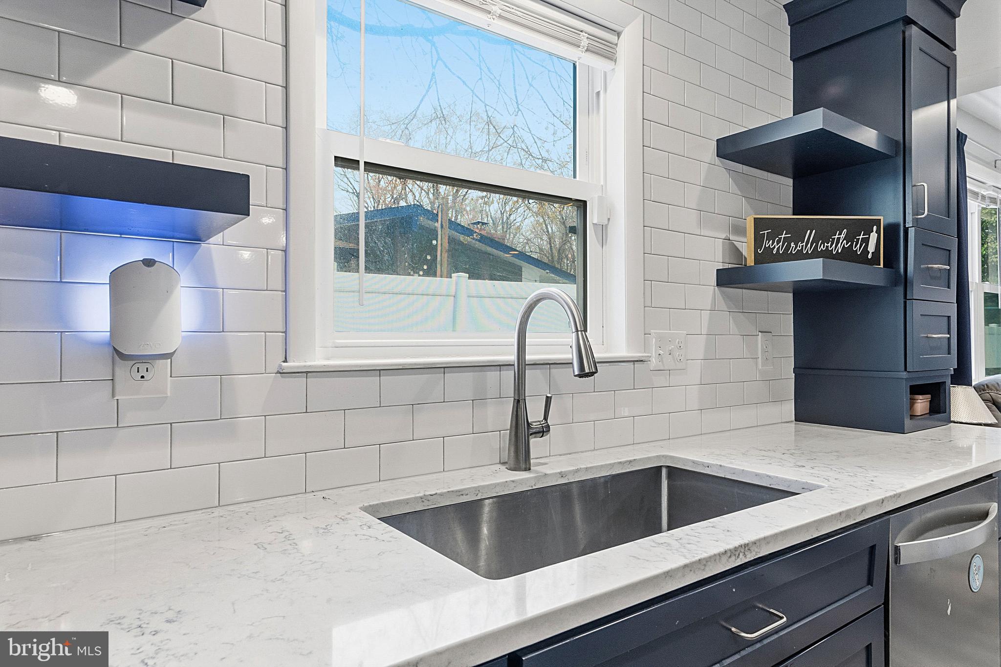 307 Hialeah Drive Cherry Hill, NJ 08002 - Photo 7 of 34 a kitchen with stainless steel appliances a sink and a microwave