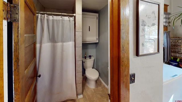 a kitchen with stainless steel appliances a stove and a microwave