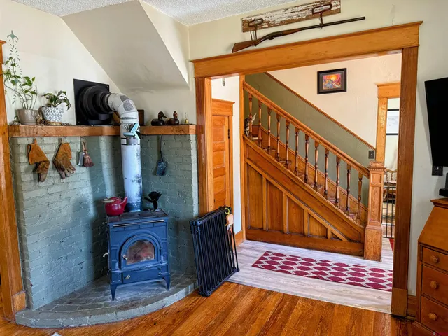 a view of an entryway with wooden floor