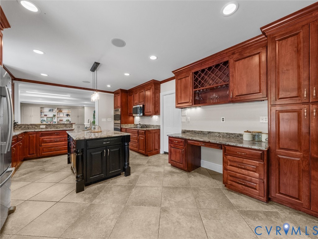 13099 Cedon Road Ashland, VA 23005 - Photo 17 of 92 Chef's kitchen featuring rich wood cabinetry, stai