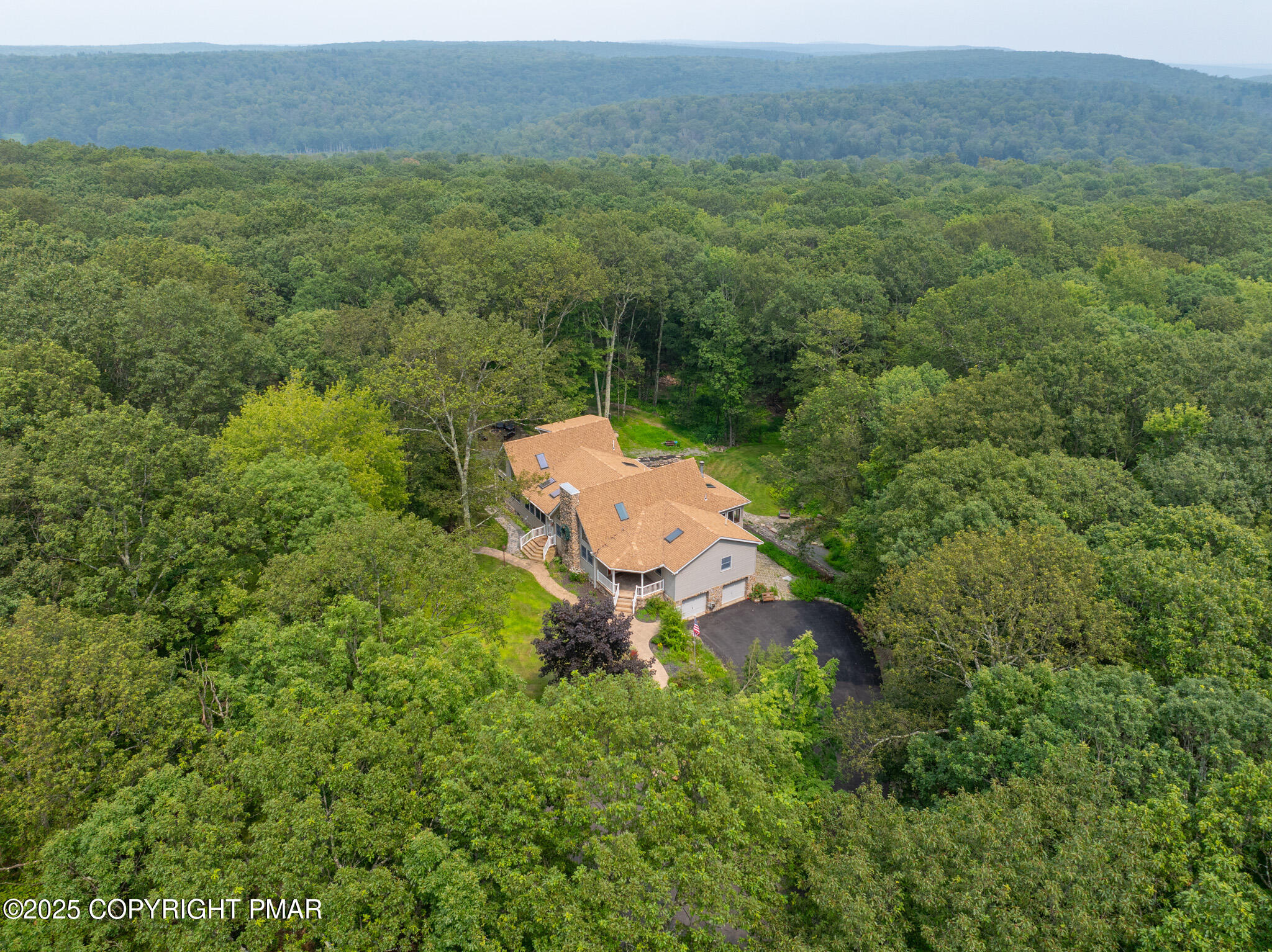 142 Bloss Road Canadensis, PA 18325 - Photo 14 of 109 a aerial view of a house with a yard