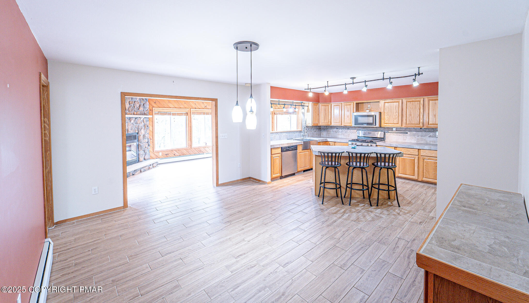 142 Bloss Road Canadensis, PA 18325 - Photo 21 of 109 a dining room with furniture window wooden floor