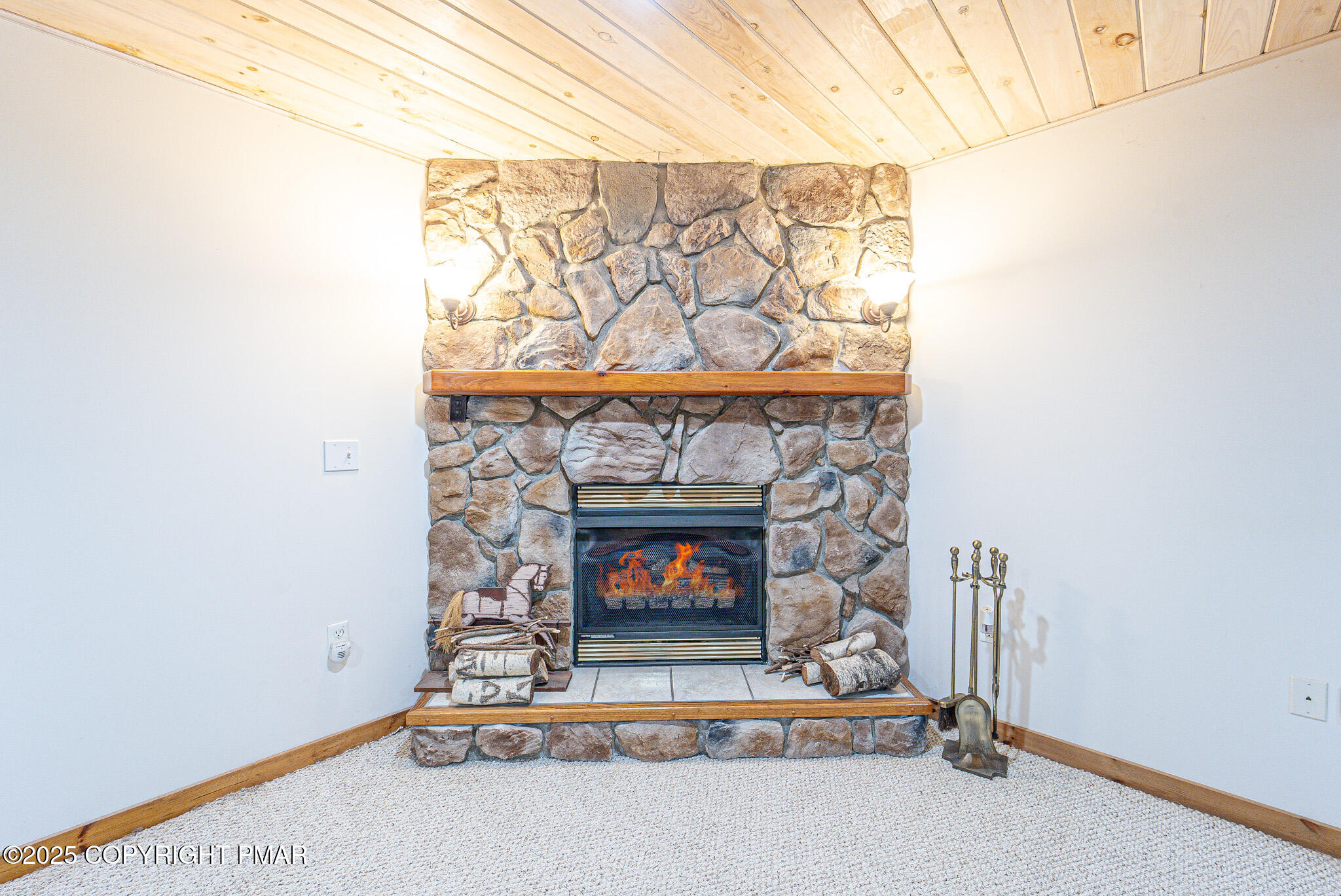 142 Bloss Road Canadensis, PA 18325 - Photo 38 of 109 a living room with a fireplace