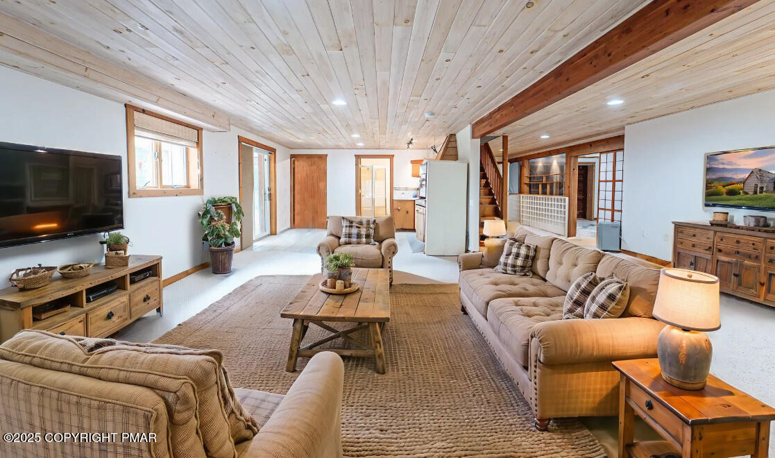 142 Bloss Road Canadensis, PA 18325 - Photo 39 of 109 a living room with furniture and a flat screen tv