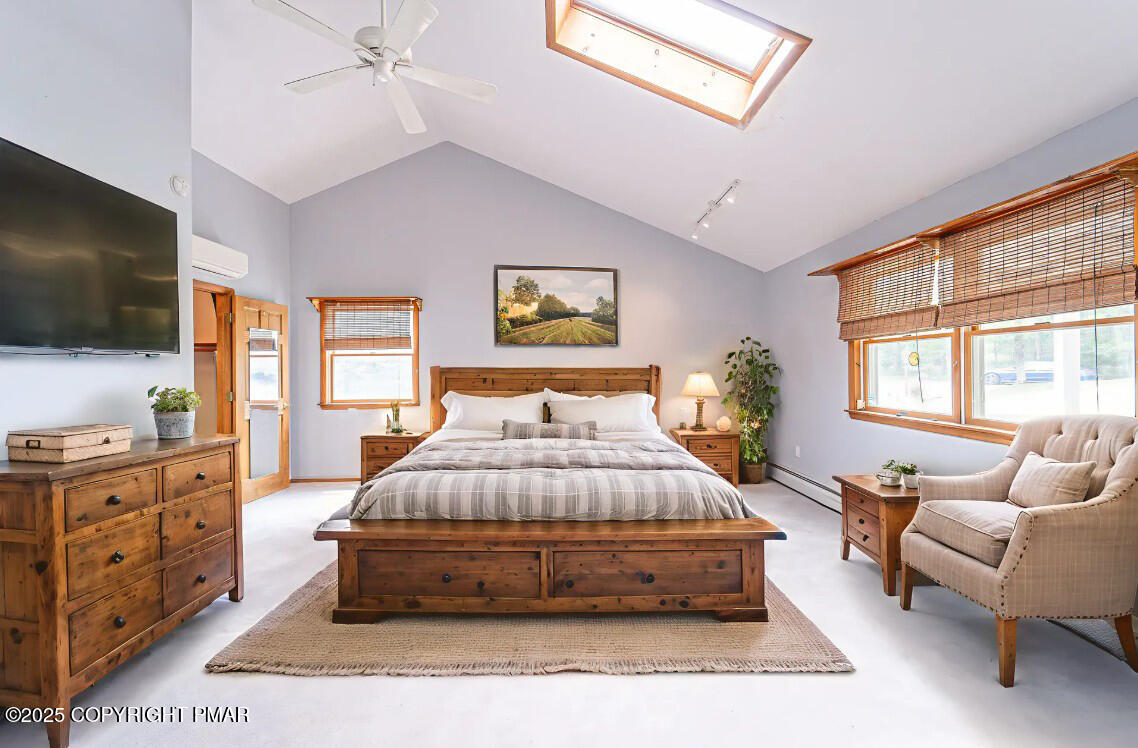 142 Bloss Road Canadensis, PA 18325 - Photo 64 of 109 a spacious bedroom with a bed a couch and dresser