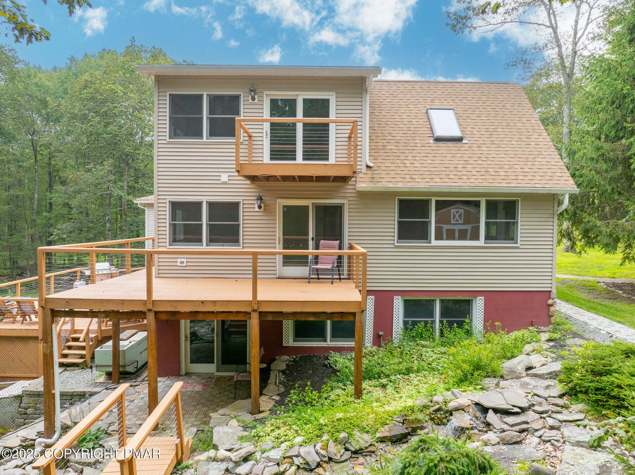142 Bloss Road Canadensis, PA 18325 - Photo 7 of 109 a aerial view of a house with a yard and potted plants