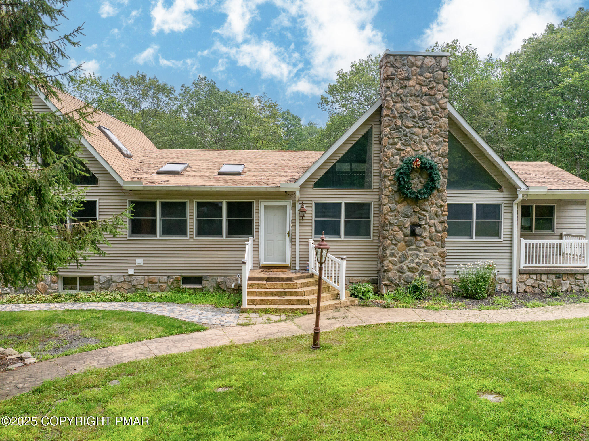 142 Bloss Road Canadensis, PA 18325 - Photo 9 of 109 a front view of a house with a yard