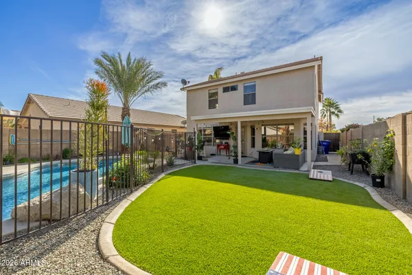 a view of a backyard with a garden and plants
