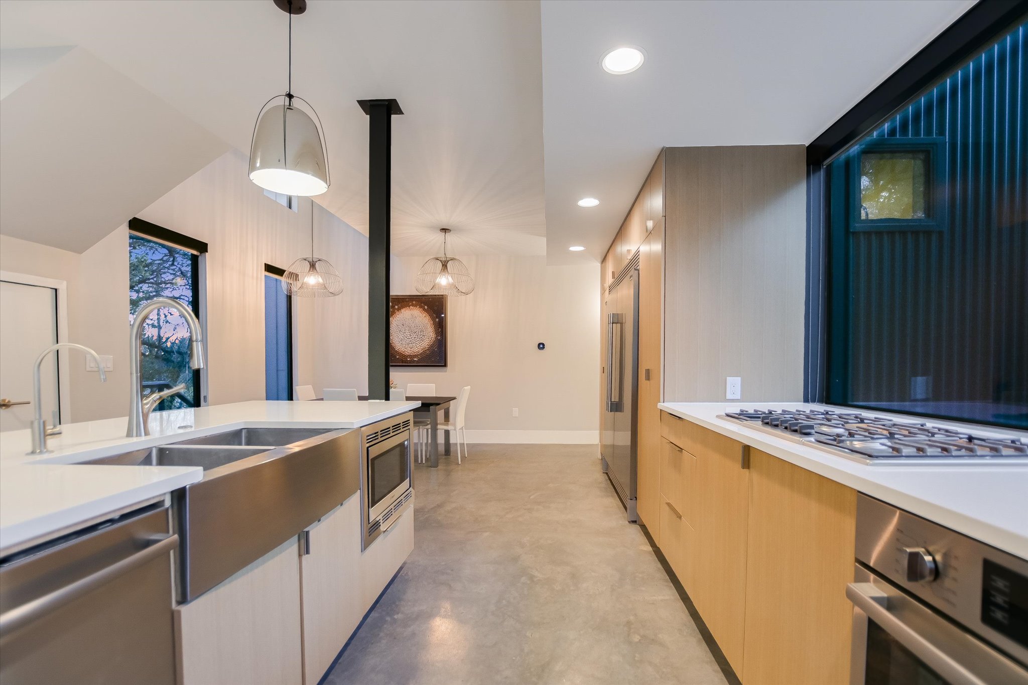 1325 Bonham Terrace, Unit A Austin, TX 78704 - Photo 5 of 25 a large kitchen with a stove and a sink
