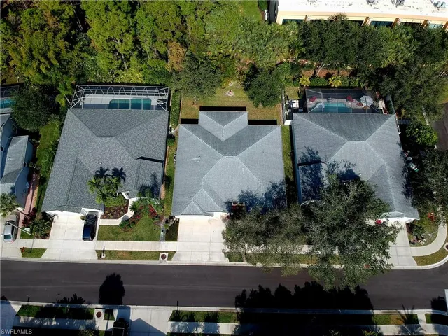 an aerial view of a house with outdoor space