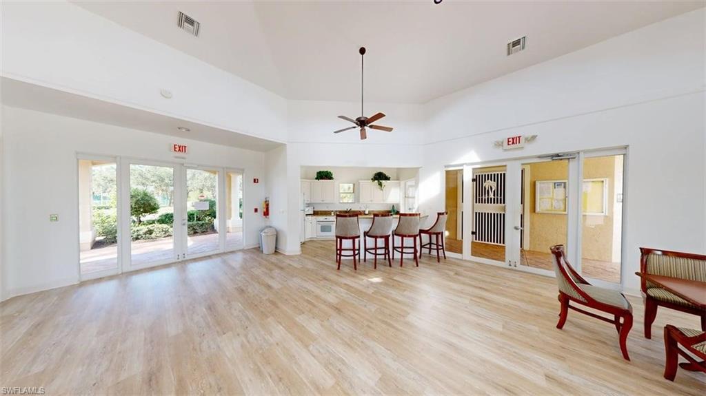 285 Spider Lily Lane Naples, FL 34119 - Photo 5 of 50 a view of a dining room with furniture window and outside view