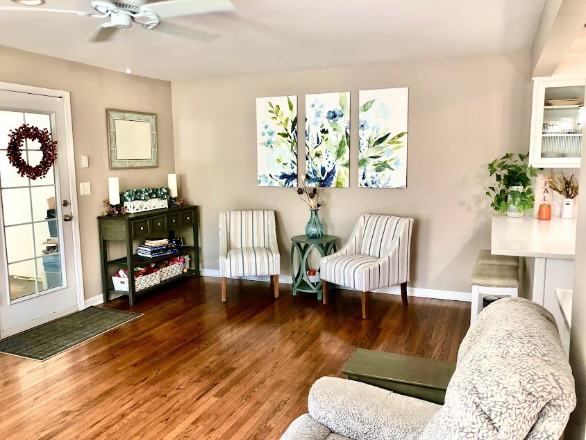 1603 Stonebridge Trail Wheaton, IL 60189 - Photo 17 of 33 a living room with furniture and a wooden floor