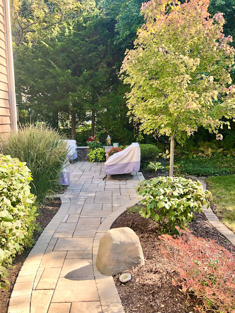 1603 Stonebridge Trail Wheaton, IL 60189 - Photo 4 of 33 a view of a backyard with sitting area