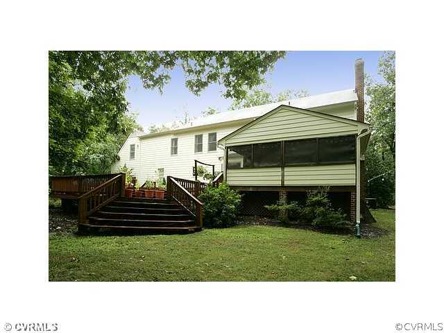 17182 White Pine Road Beaverdam, VA 23015 - Photo 11 of 12 a front view of a house with a yard