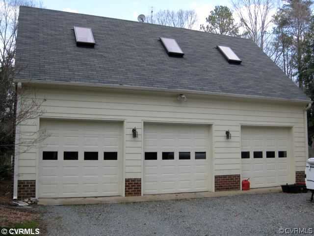 17182 White Pine Road Beaverdam, VA 23015 - Photo 12 of 12 a front view of a house with a yard