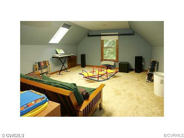 17182 White Pine Road Beaverdam, VA 23015 - Photo 6 of 12 a bed room with a bed and a television