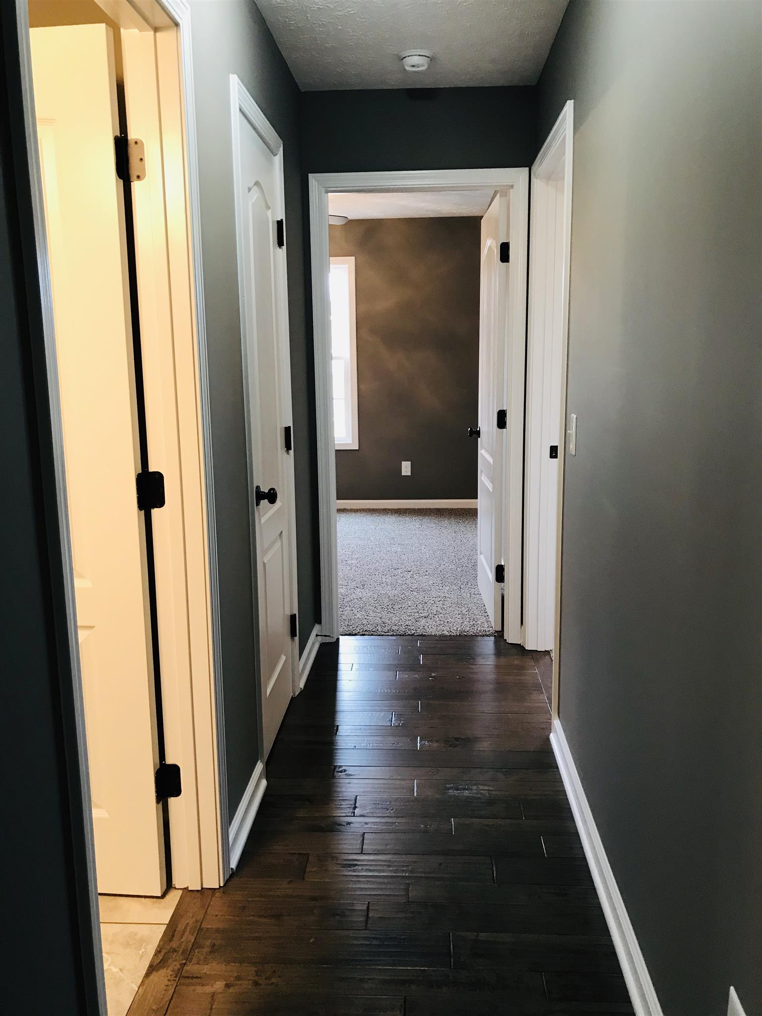 426 Fowler Ford Road Portland, TN 37148 - Photo 16 of 19 a view of hallway with wooden floor