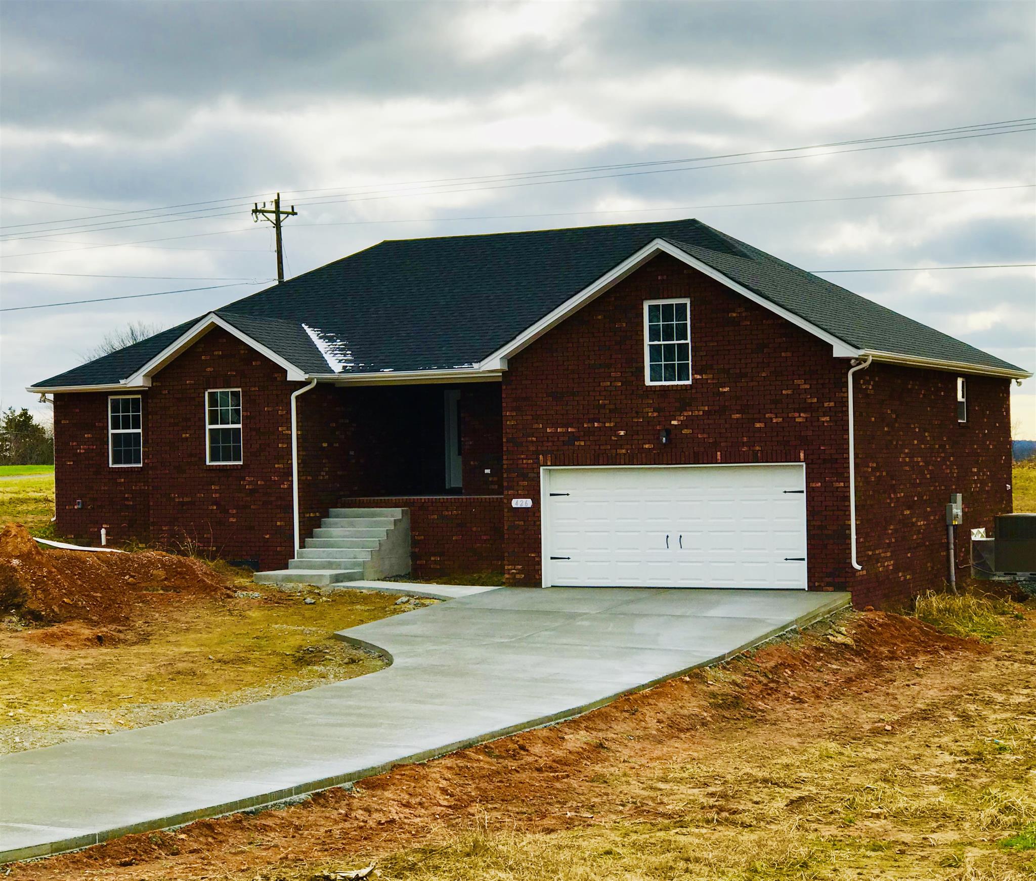 426 Fowler Ford Road Portland, TN 37148 - Photo 2 of 19 a front view of a house with a yard
