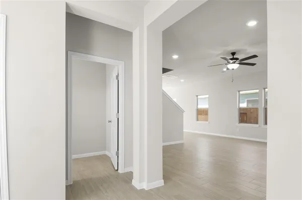 a view of an empty room with a window