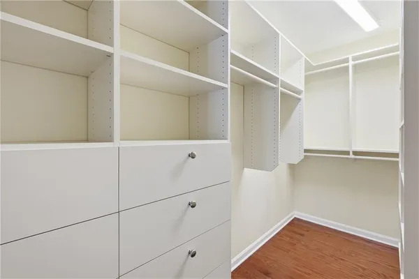 a view of an empty walk in closet