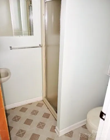a bathroom with a sink and a toilet