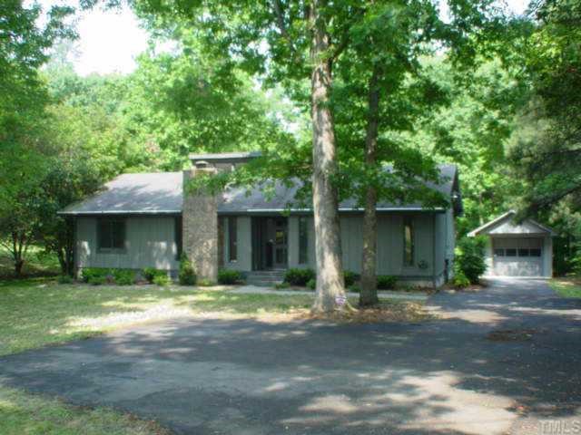 6617 Louisburg Road Raleigh, NC 27616 - Photo 1 of 1 Home is nestled back on large wooded lot with fenced back yard.