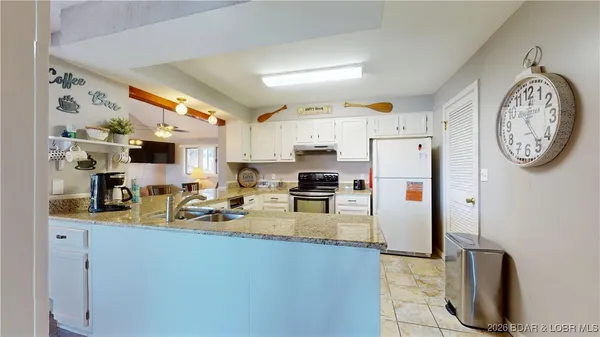 $712,000 | 5940 Baydy Peak Road, Unit 1233 & 1234, Osage Beach, MO 65065