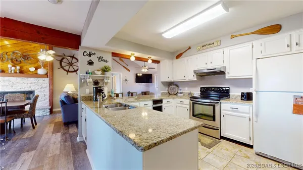 $712,000 | 5940 Baydy Peak Road, Unit 1233 & 1234, Osage Beach, MO 65065