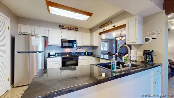 $712,000 | 5940 Baydy Peak Road, Unit 1233 & 1234, Osage Beach, MO 65065