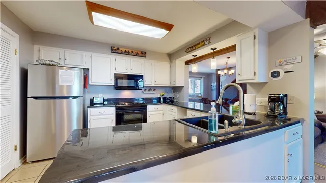 $712,000 | 5940 Baydy Peak Road, Unit 1233 & 1234, Osage Beach, MO 65065