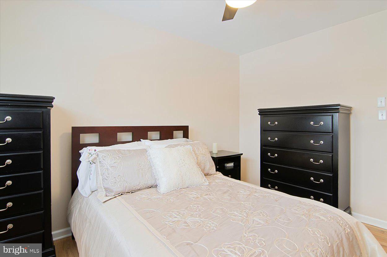 10 Elizabeth Court Edison, NJ 08817 - Photo 16 of 38 a bedroom with a bed and a night stand