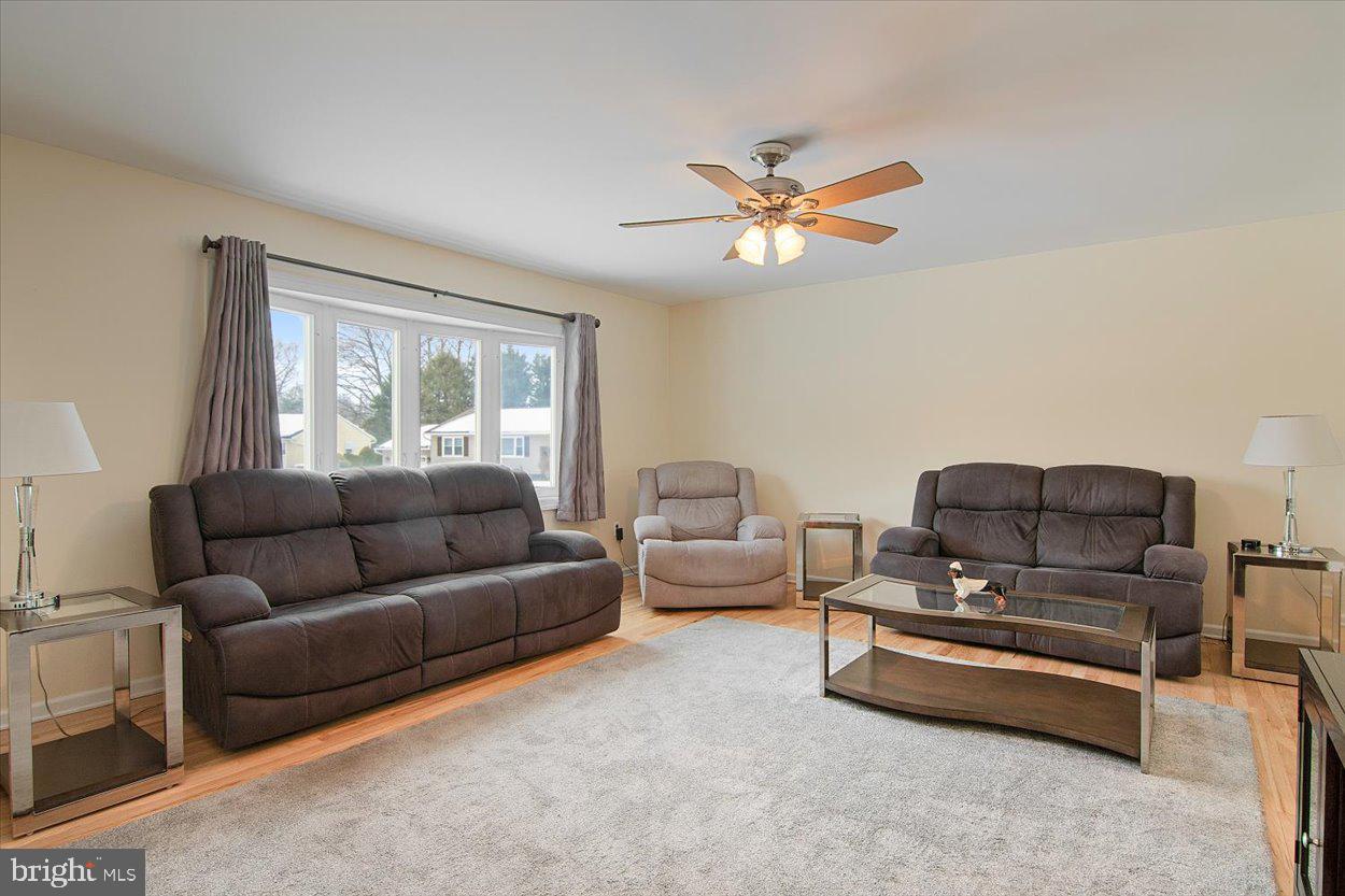 10 Elizabeth Court Edison, NJ 08817 - Photo 3 of 38 a living room with furniture and a window