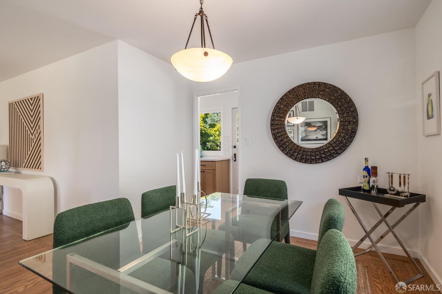 771 Creston Road Berkeley, CA 94708 - Photo 17 of 45 a living room with furniture and a mirror