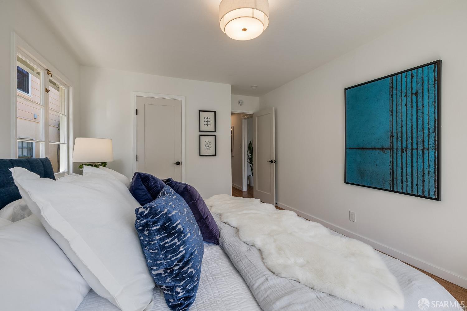 771 Creston Road Berkeley, CA 94708 - Photo 24 of 45 a bedroom with a bed and a window