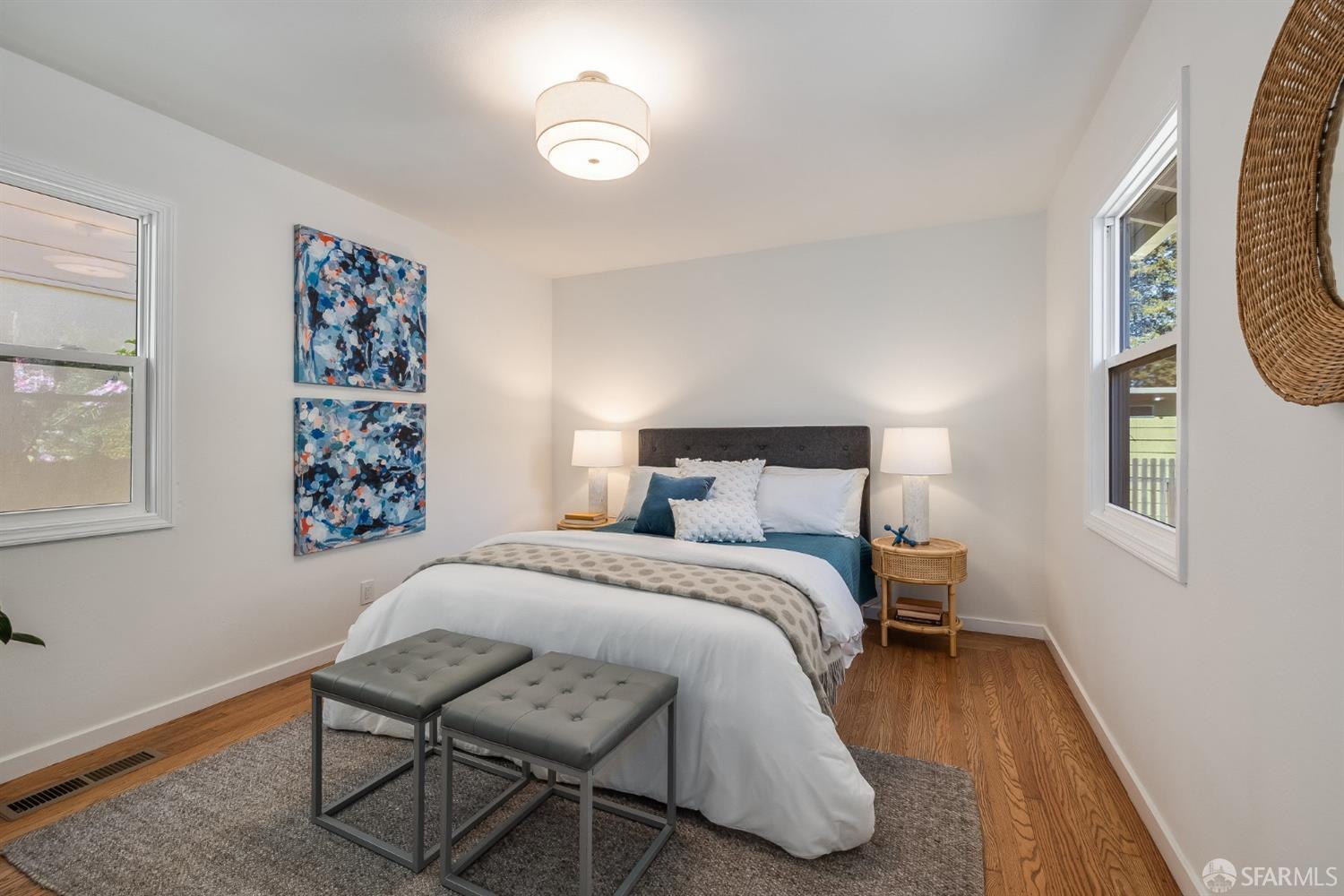 771 Creston Road Berkeley, CA 94708 - Photo 27 of 45 a bedroom with a bed and painting on the wall