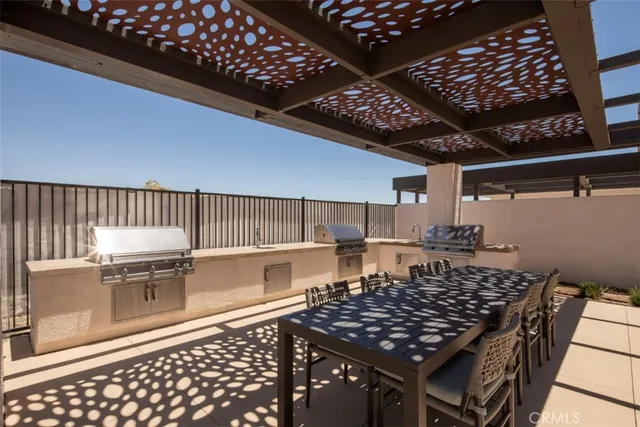 a living room with furniture and a patio