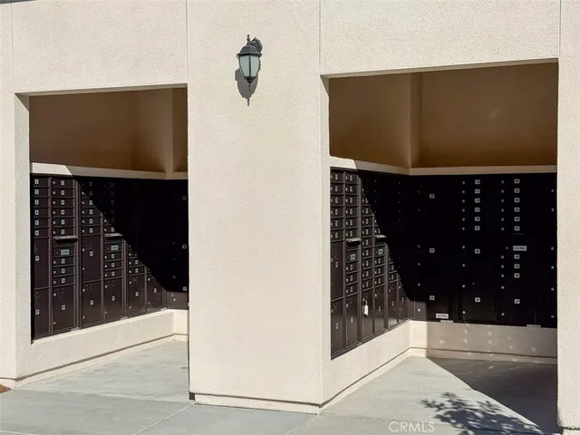 a view of a swimming pool with outdoor seating