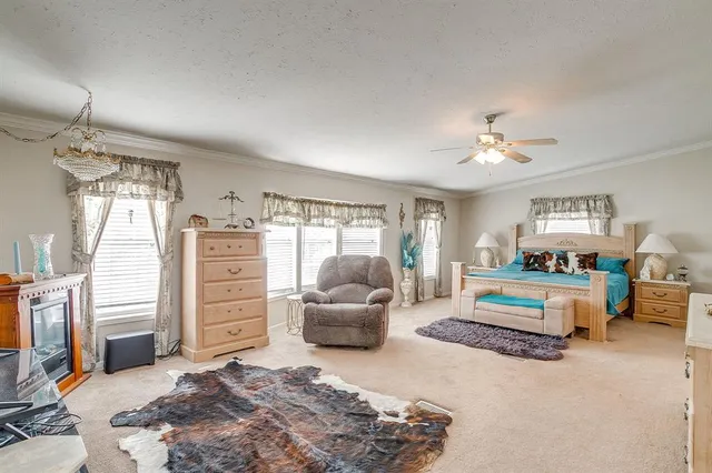 a bedroom with a bed and furniture